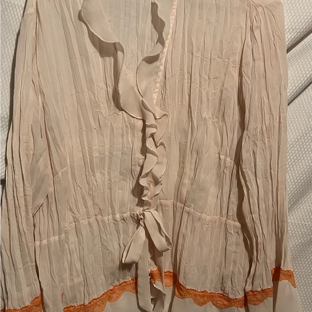 Elegant Cream Blouse with Orange Accents